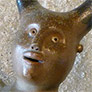 Décoration de toit : personnage de faune sculpté