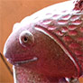 Sculpture céramique personnage et poisson